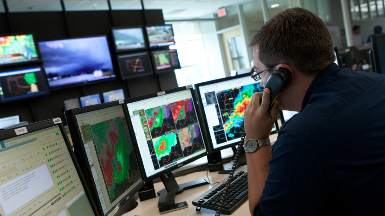 A National Weather Service meteorologist in Norman, Oklahoma, tracks a super cell tornado outbreak.
