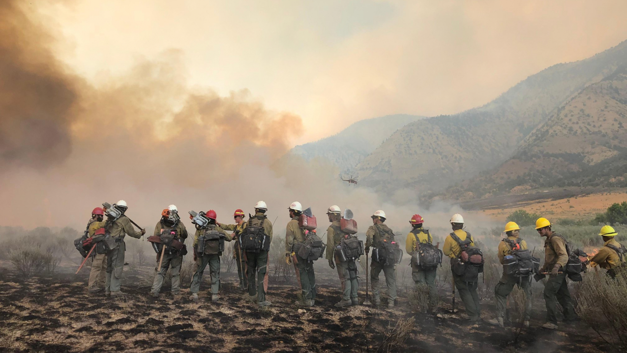 Firefighters on the march: The Pine Gulch Fire, smoke of which shown here, was started by a lightning strike on July 31, 2020, approximately 18 miles north of Grand Junction, Colorado. According to InciWeb, as of August 27, 2020, the Pine Gulch Fire became the largest wildfire in Colorado State history, surpassing the Hayman Fire that burned near Colorado Springs in the summer of 2002. 