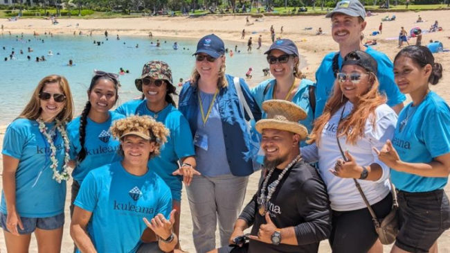 Kuleana Coral Reef team gathers at a public outreach event in 2023 at Pokai Bay, Hawaii.
