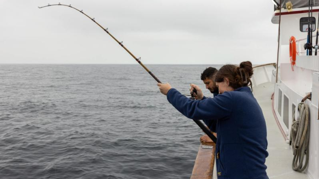 Recreational anglers fish for rockfish on a recreational fishing boat off Southern California.