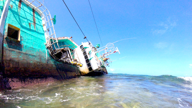 Fishing Vessel Seahawk aground on the reef flat of Nu'uuli Pala Lagoon, Tutuila.