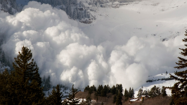 An avalanche occurs at an elevation of 10,500 feet at Elk Point, Utah, in the Wasatch Mountain range.