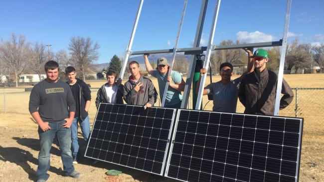 High school teacher Ben Graves received funding from NOAA Planet Stewards to develop a solar energy training course. His students designed and installed the 2.4 kW solar array to power the science wing of their school.