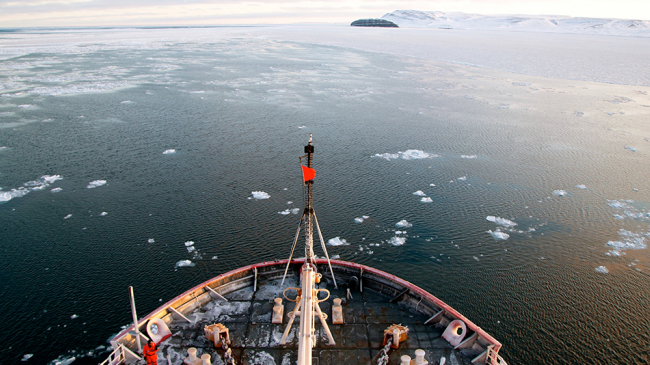 Looking down on the deck of US Coast Guard Cutter Healy as it cruises through the Chukchi Sea during a 2014 expedition. NOAA scientists will return to the Arctic this week aboard Healy to study of environmental change. 