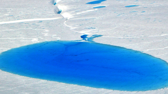 A lake of meltwater on the Greenland Ice Sheet on July 19, 2017. 