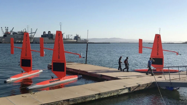 A fleet of Saildrones in Alamedia, Calif., awaits to be deployed to the Pacific Ocean.