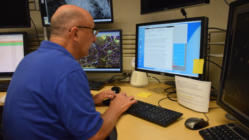 NOAA National Hurricane Center senior hurricane specialist Lixion Avila, Ph.D., prepares an advisory for Hurricane Matthew on October 5, 2016.