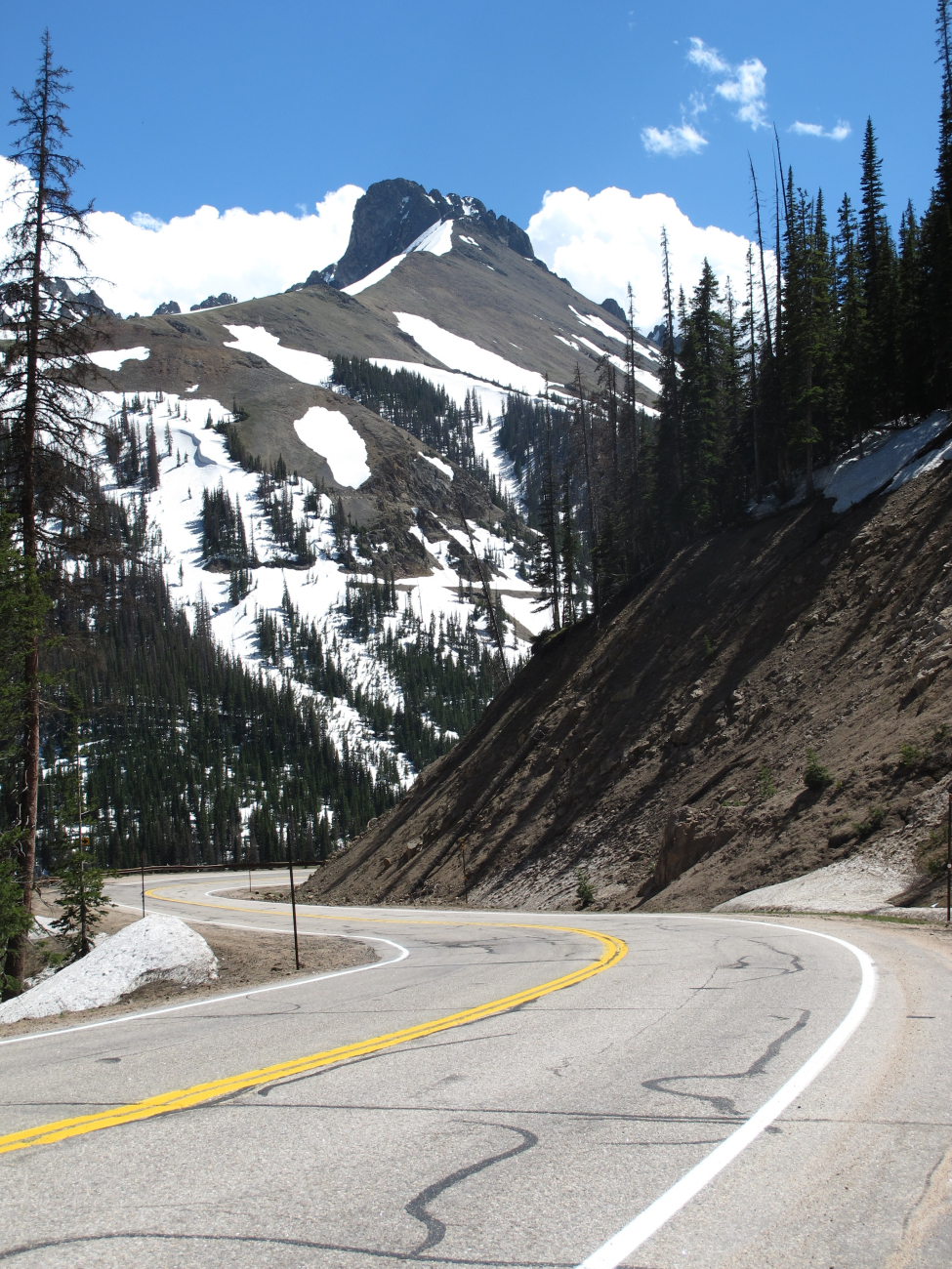 The road down the west side of Cameron Pass with the Crags overlooking theswitchbacks on the Highway 14
