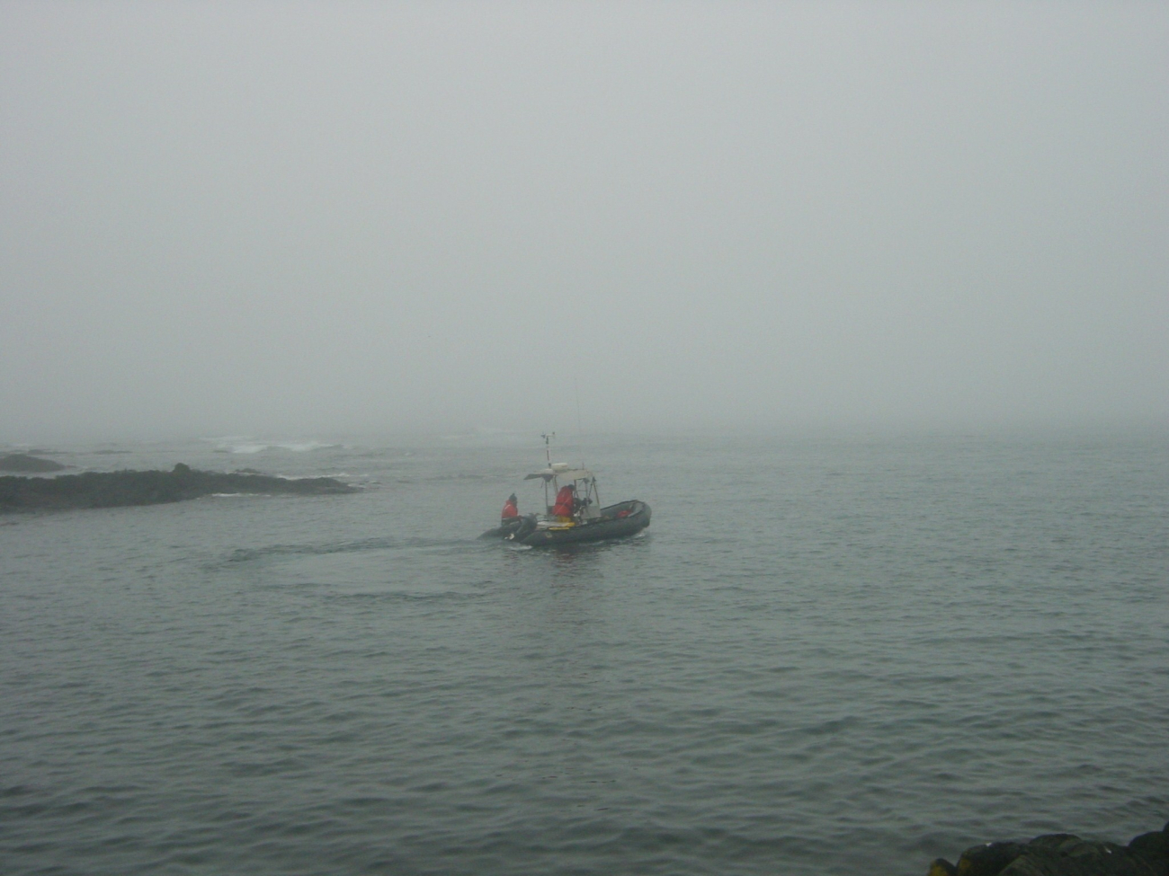 Mapping team going to work on foggy grey day