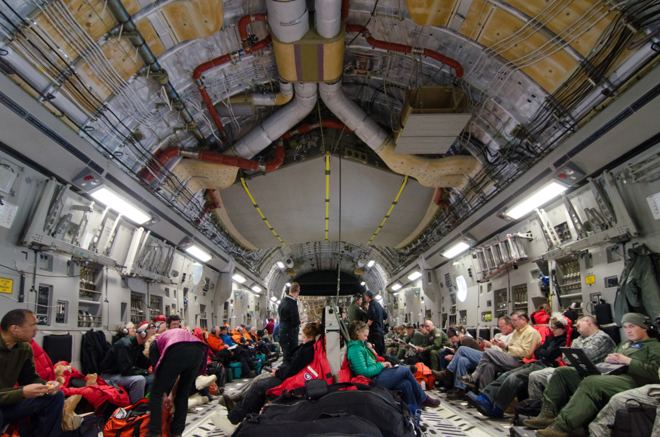Scientists leaving South Pole Station on C-17 Globemaster