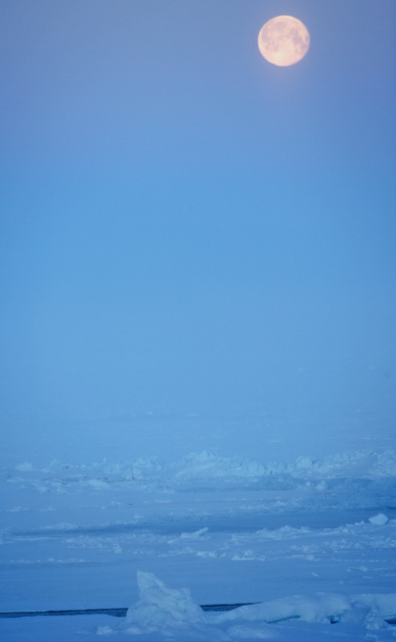 A full moon over Arctic ice