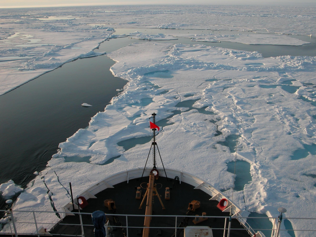 The USCG Icebreaker HEALY cuts through ice sheets in the Arctic Oceanto ferry scientists to various research locations where they will conductscientific research on marine life in all realms of the Canada Basin,one of the deepest parts of the Arctic Ocean