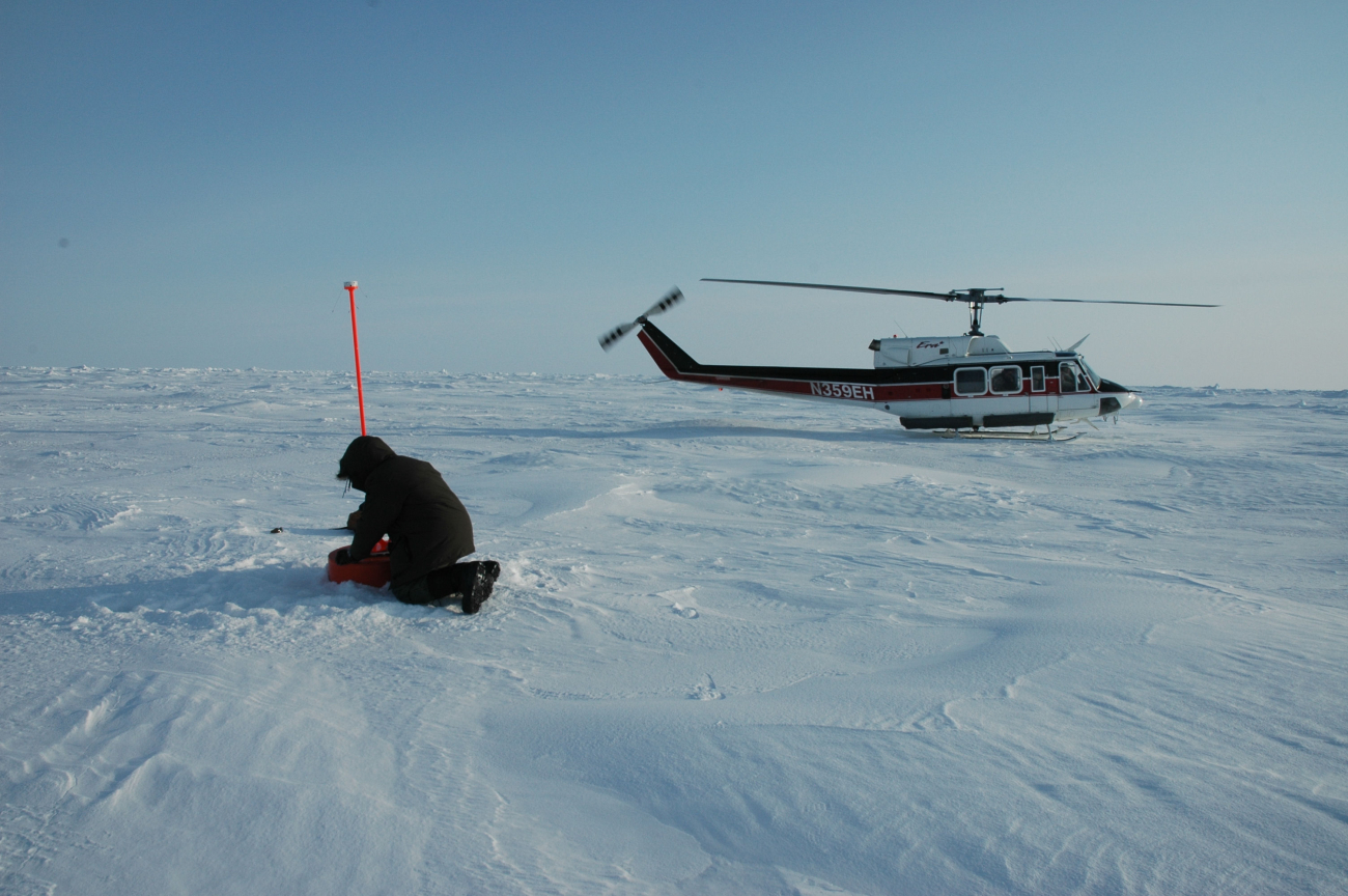 Placing an ice beacon that measures air temperature and pressure and monitorsmotion of ice