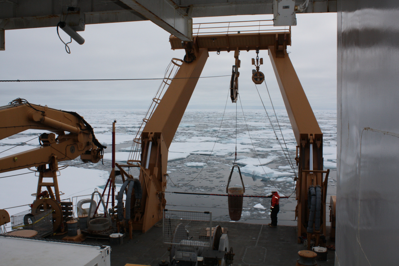 Rock dredge being deployed from stern of CG icebreaker HEALY