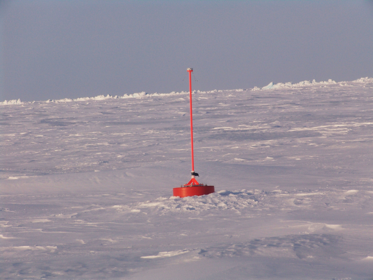 An ice beacon monitoring air temperature and pressure and ice drift