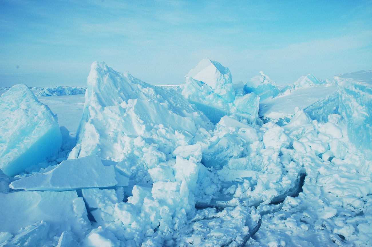 A mass of huge  blocks of ice forming a pressure ridge