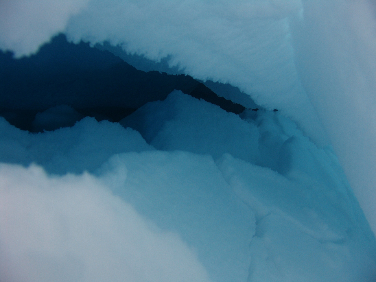 Looking down through openings within a ridge to thewaters of the Beaufort Sea
