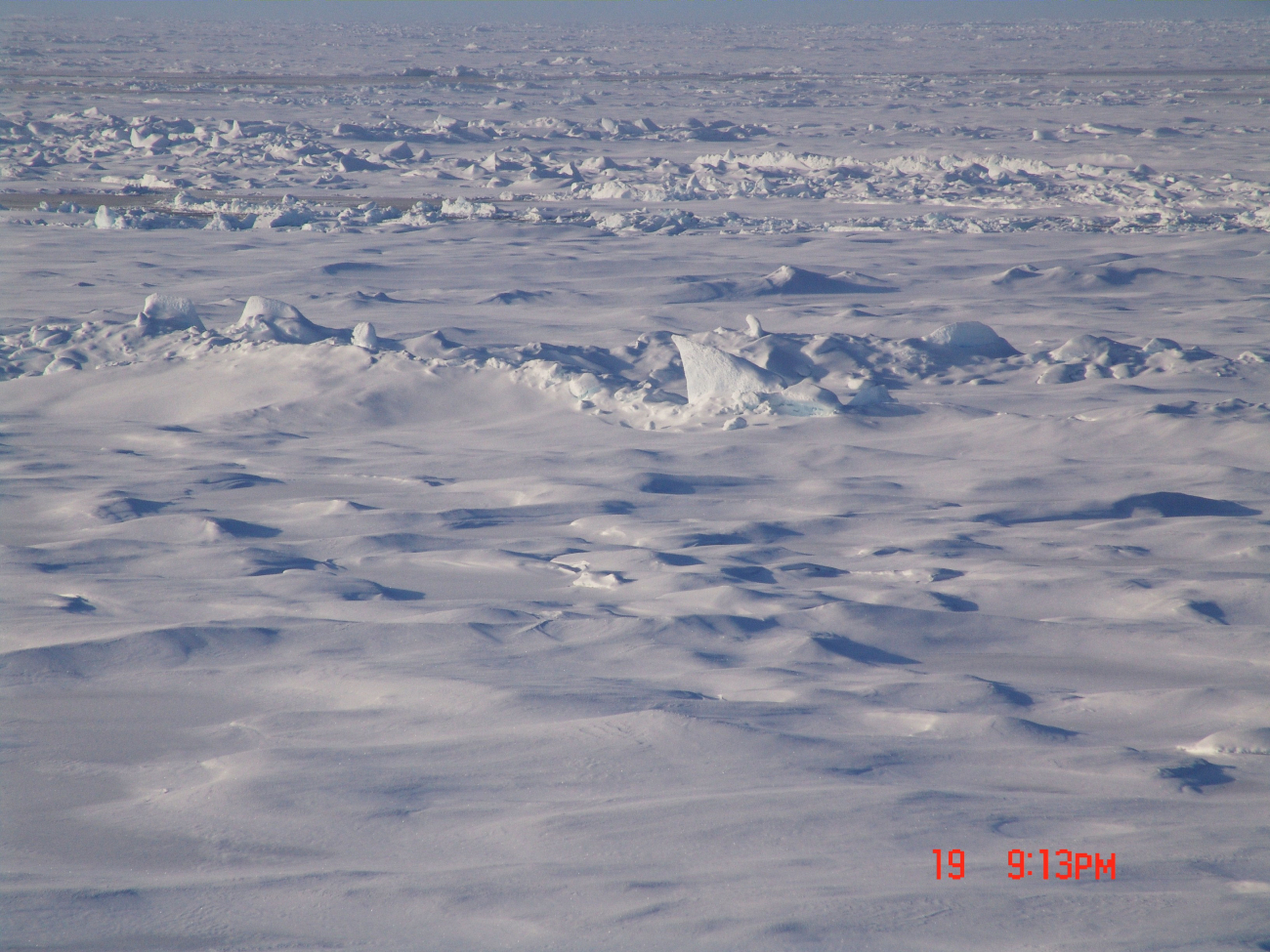 Hummocks, ice blocks, remnants of ridges, and remnants of melt pools can beseen in this image