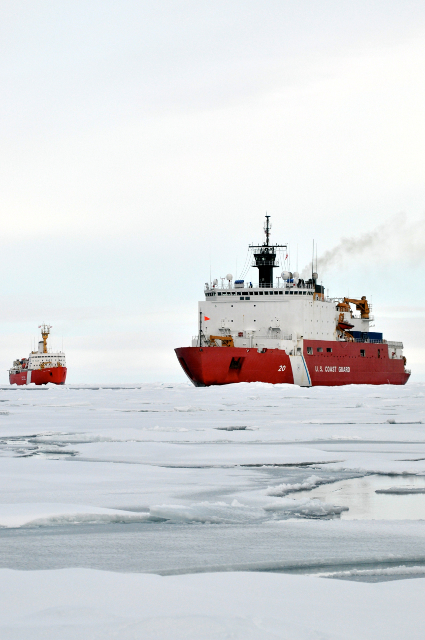 USCG icebreaker HEALY in relatively smooth first-year ice floesfollowed by the Canadian Coast Guard icebreaker LOUIS S