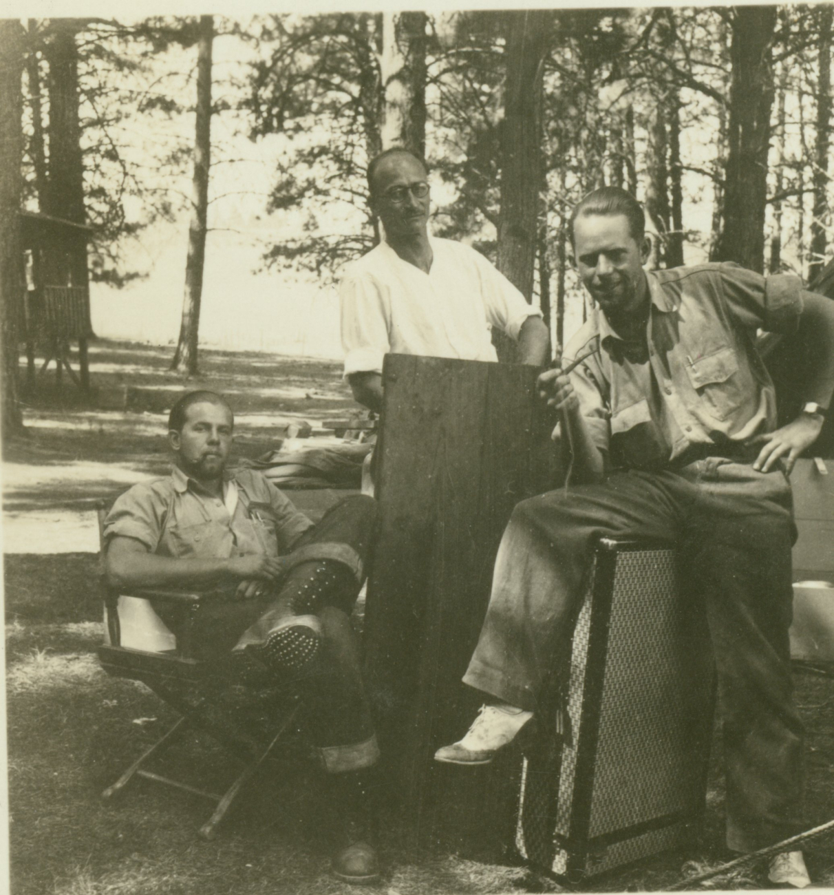 Clarence Olson, Bill Husemeyer, and Floyd Risvold breaking camp atGraingerville, Idaho