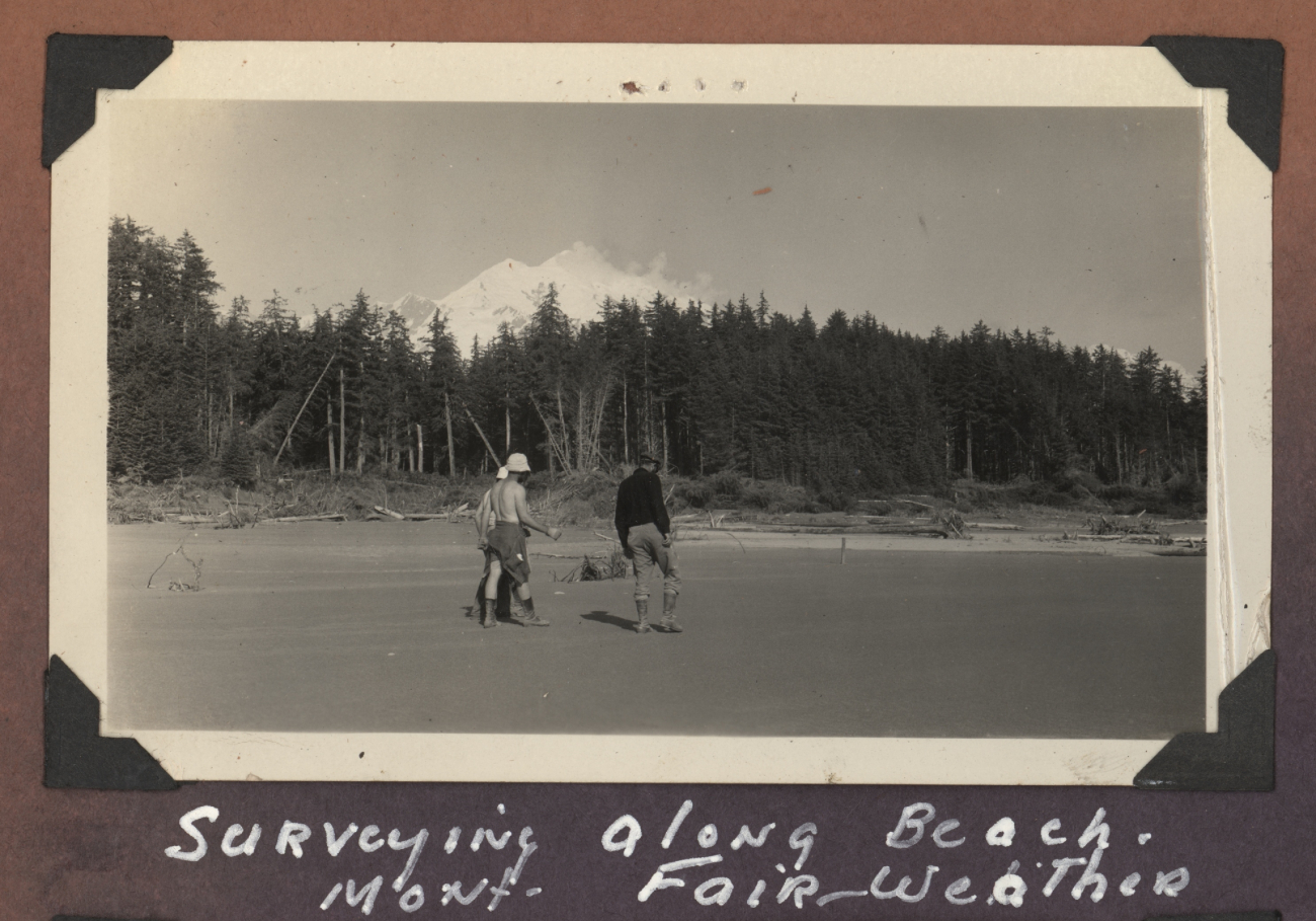 Surveying along the beach with Mount Fairweather in the background