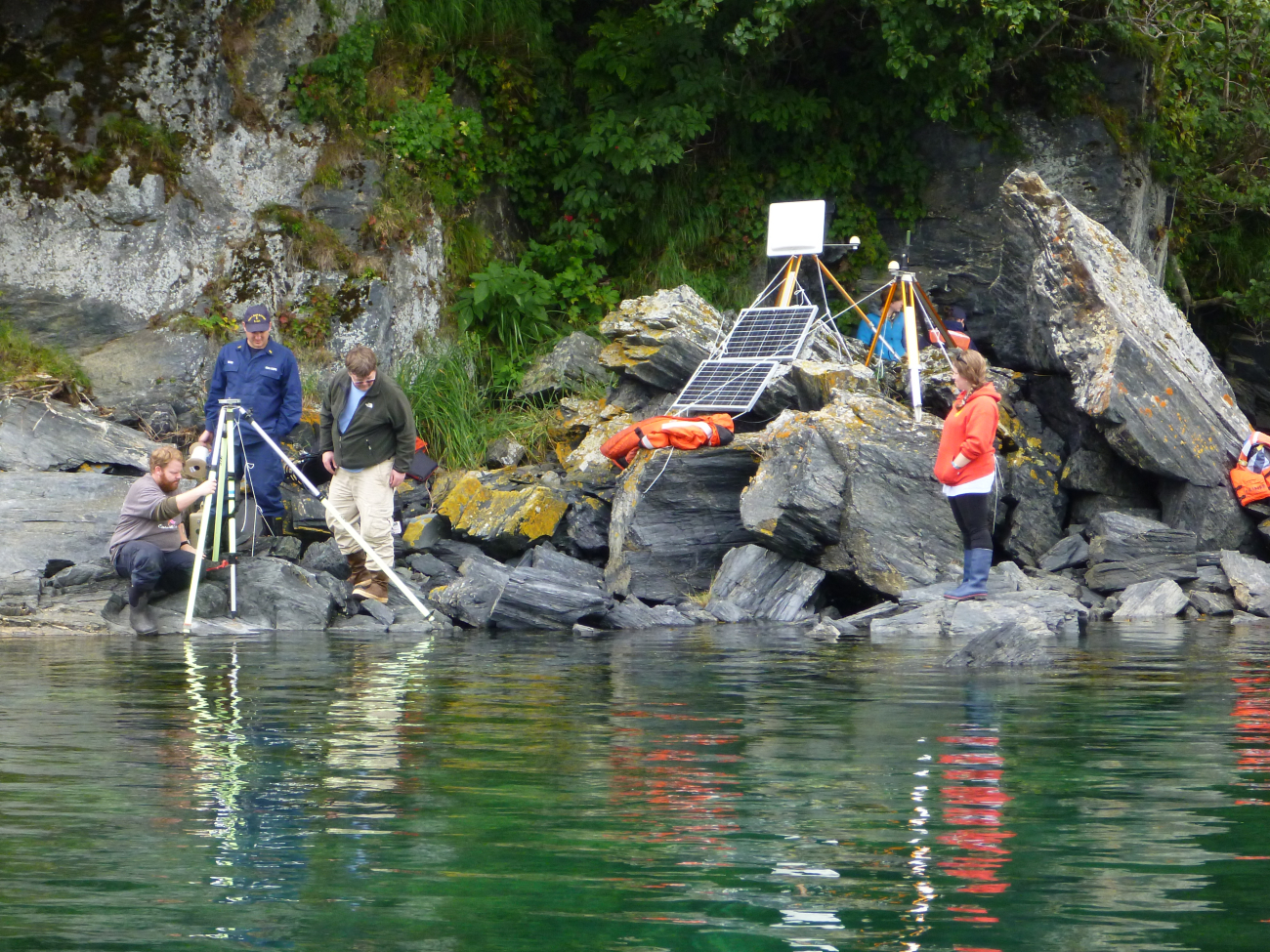 A tide gauge and horcon station (horizontal control) being set up in Terror Bay