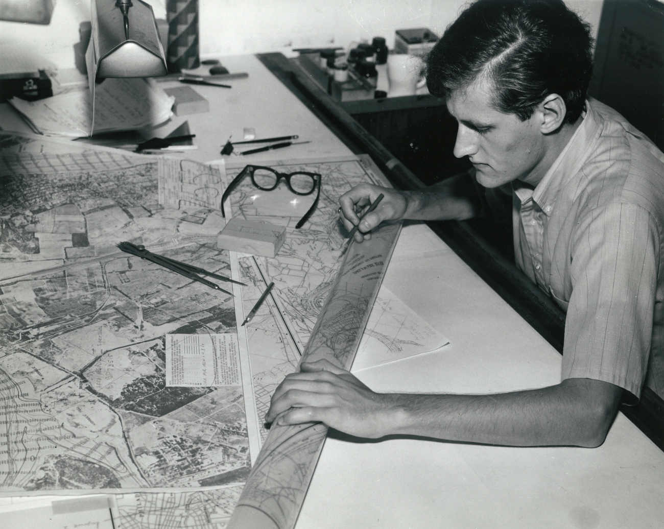 Draftsman at work on aeronautical chart