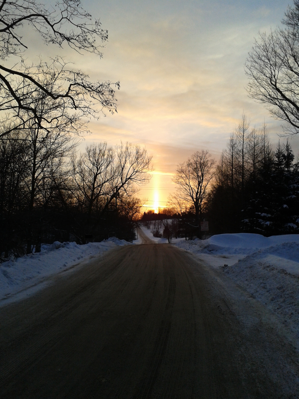 A sun pillar at the end of a cold winters day