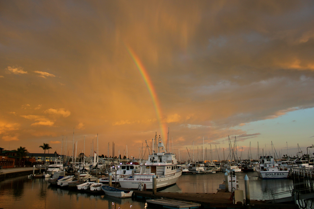 Good luck and good fishing! Lucky rainbow over the famous San Diegosportfishing fleet