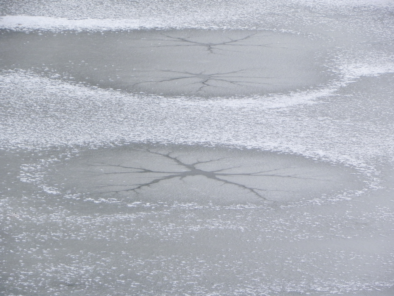 Water and ice create cool designs, or alien crop circles?