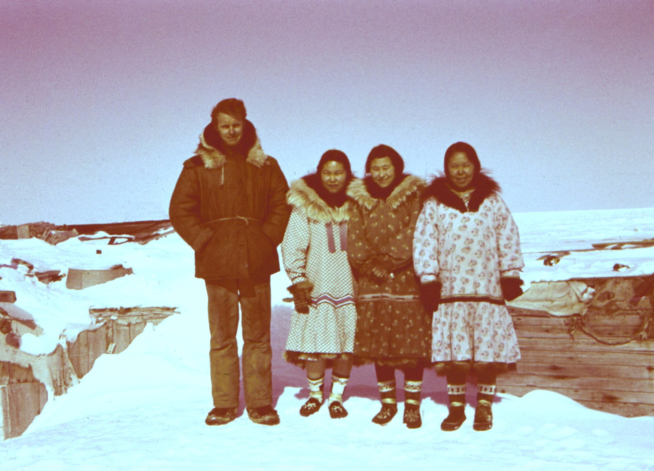 Harley Nygren with a group of Eskimos at Brownlow Pointacross from Flaxman Island