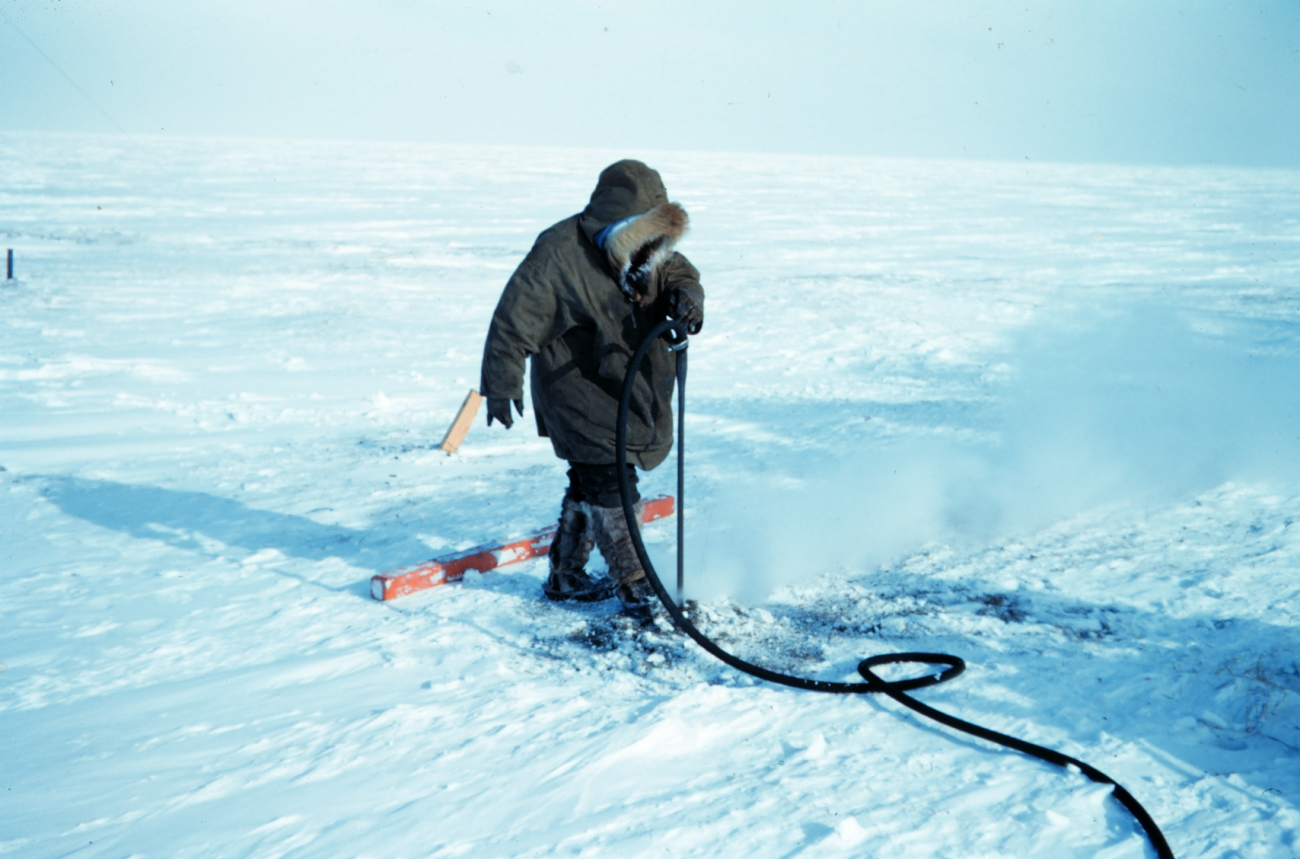 Using a boiler to melt the permafrost for setting a triangulation marker