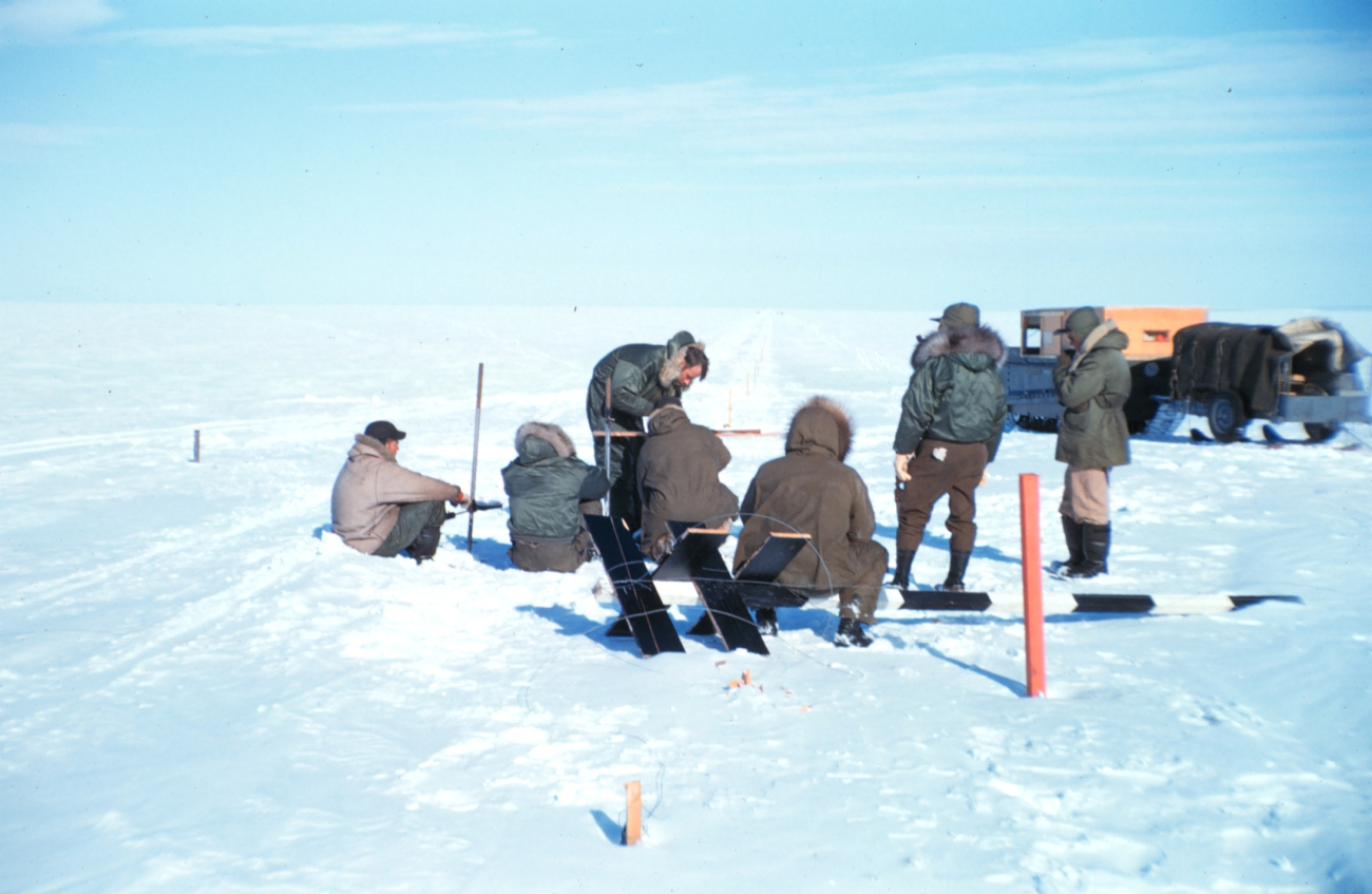 Baseline measurements on the lagoon ice - note stakes along line