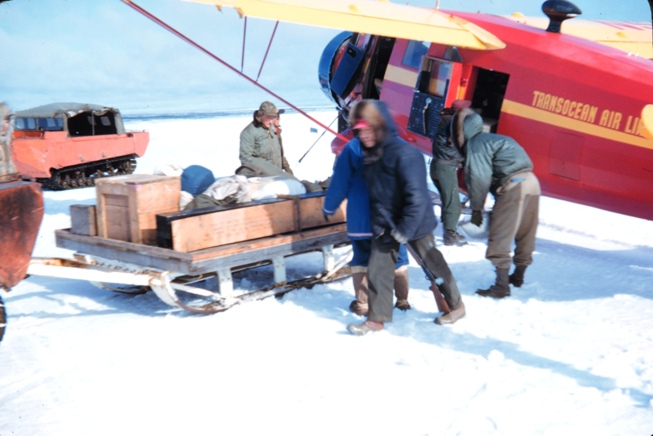 Unloading a Norseman ski-plane at Oliktok Point