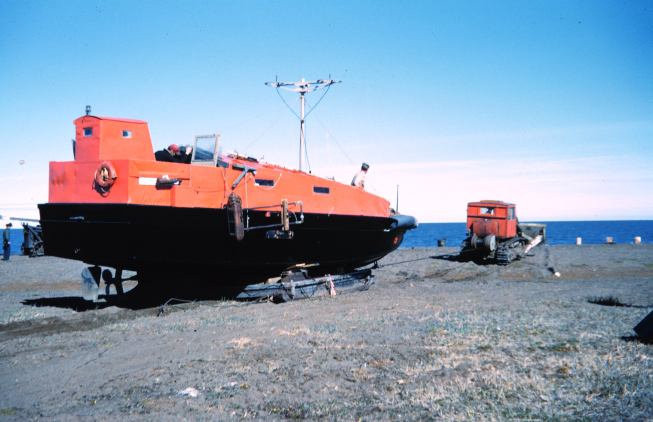 Using a caterpillar tractor to launch a survey boat