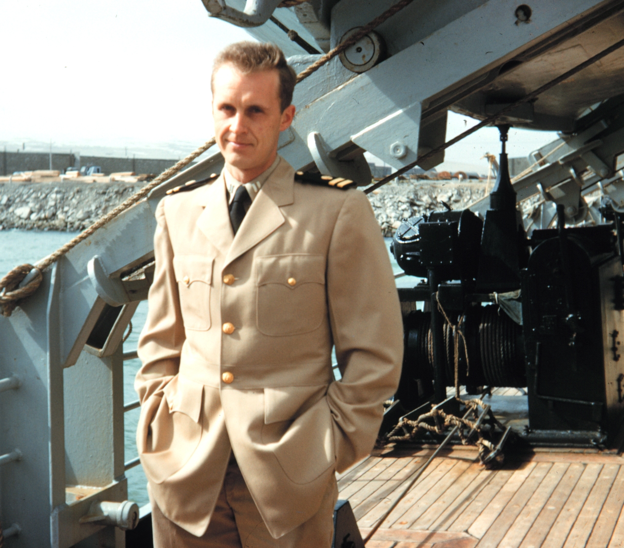 Lieutenant Harley Nygren on the PATHFINDER in dress khakis