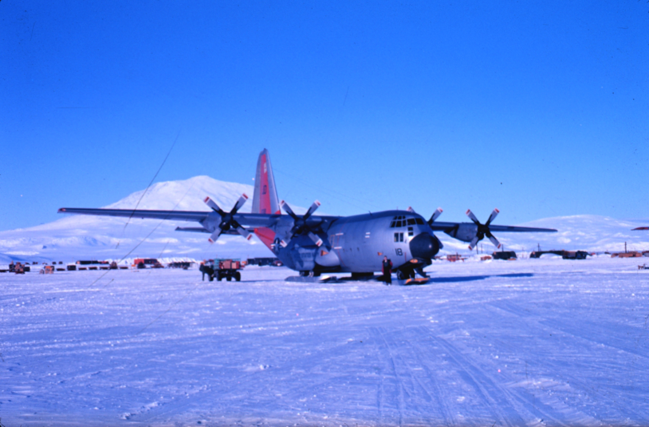 A view of Mount Erebus and the C-130 that flew scientific party from New Zealand