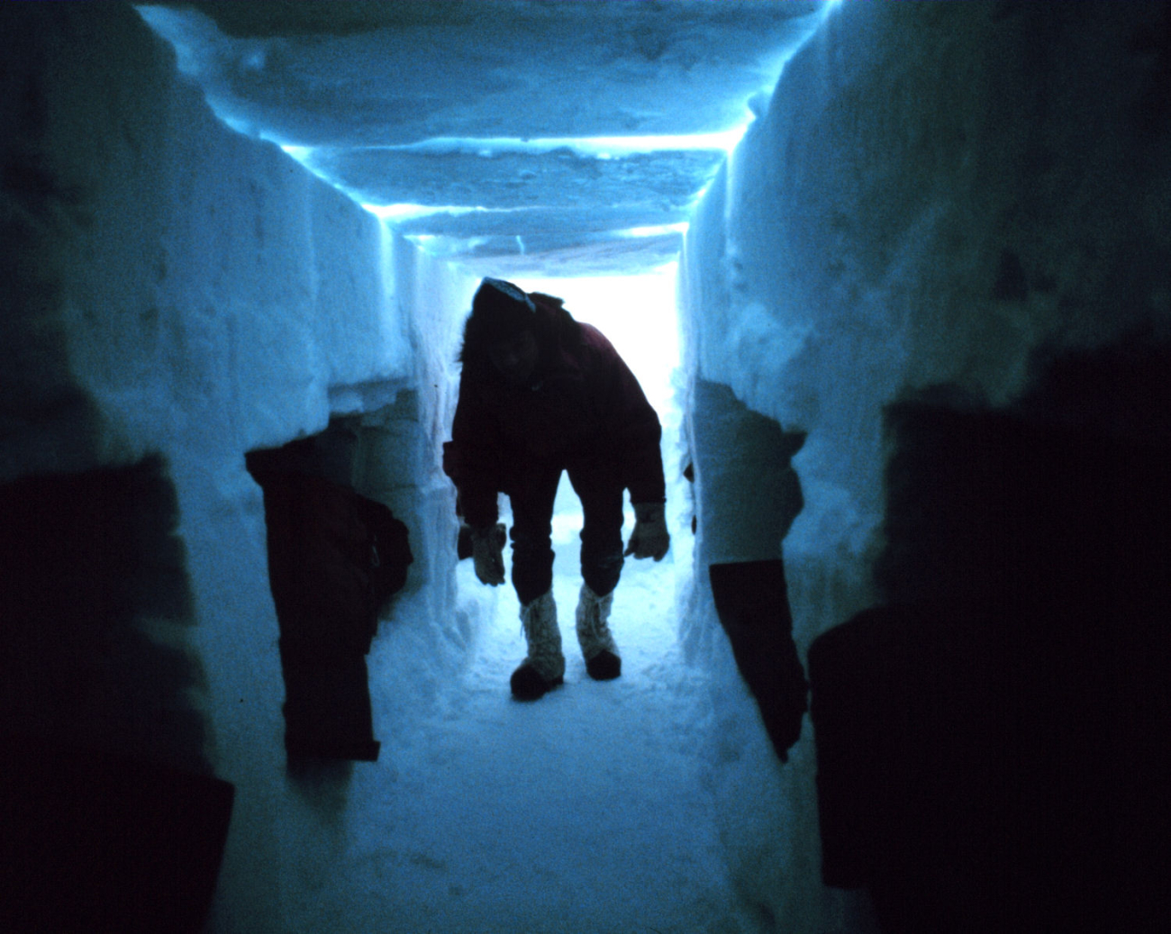 Coming into the ice shelter during survival training