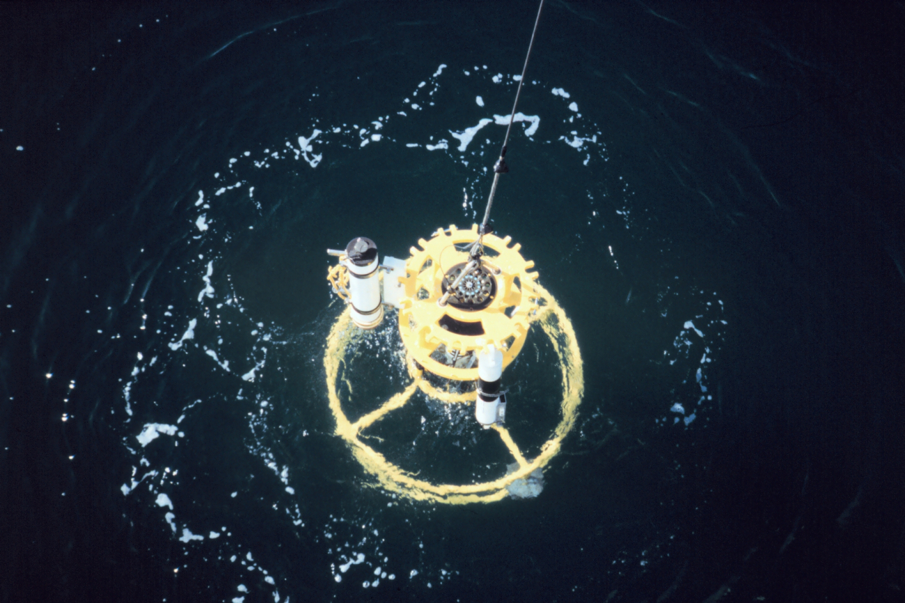 Conductivity-Temperature-Depth rosette being deployed on a rare calm day inwestern Alaska waters