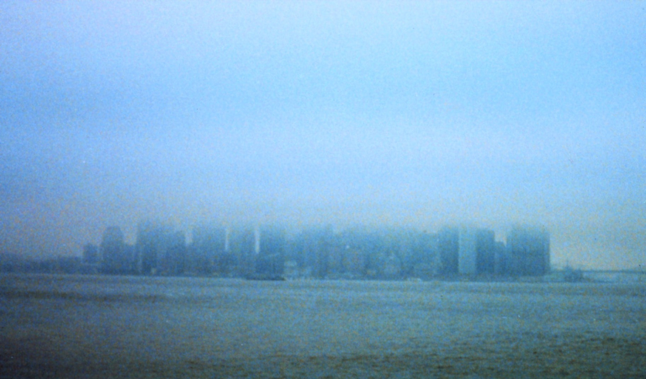 Manhattan skyline truncated by fog