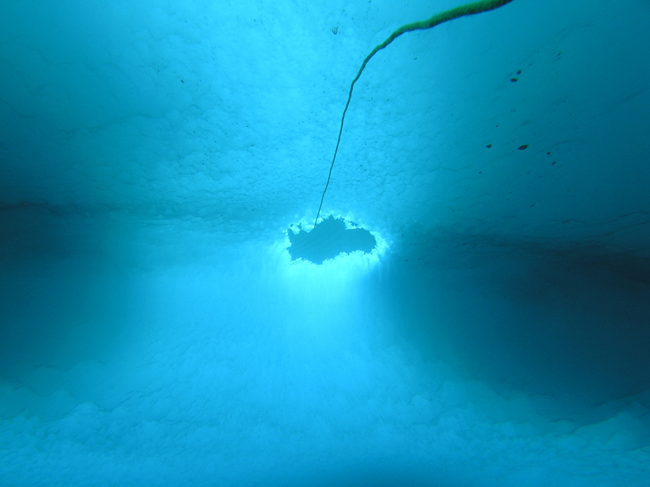 The dive entry and exit hole for under-ice divers