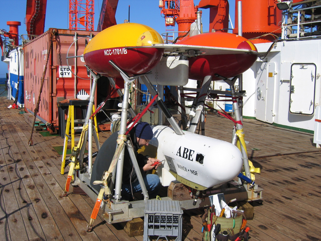 Andy Billings, an engineering assistant at Woods Hole Oceanographic Institution, makes final checks on ABE (the autonomous benthic explorer) leading up to itsfirst dive at Brothers Volcano