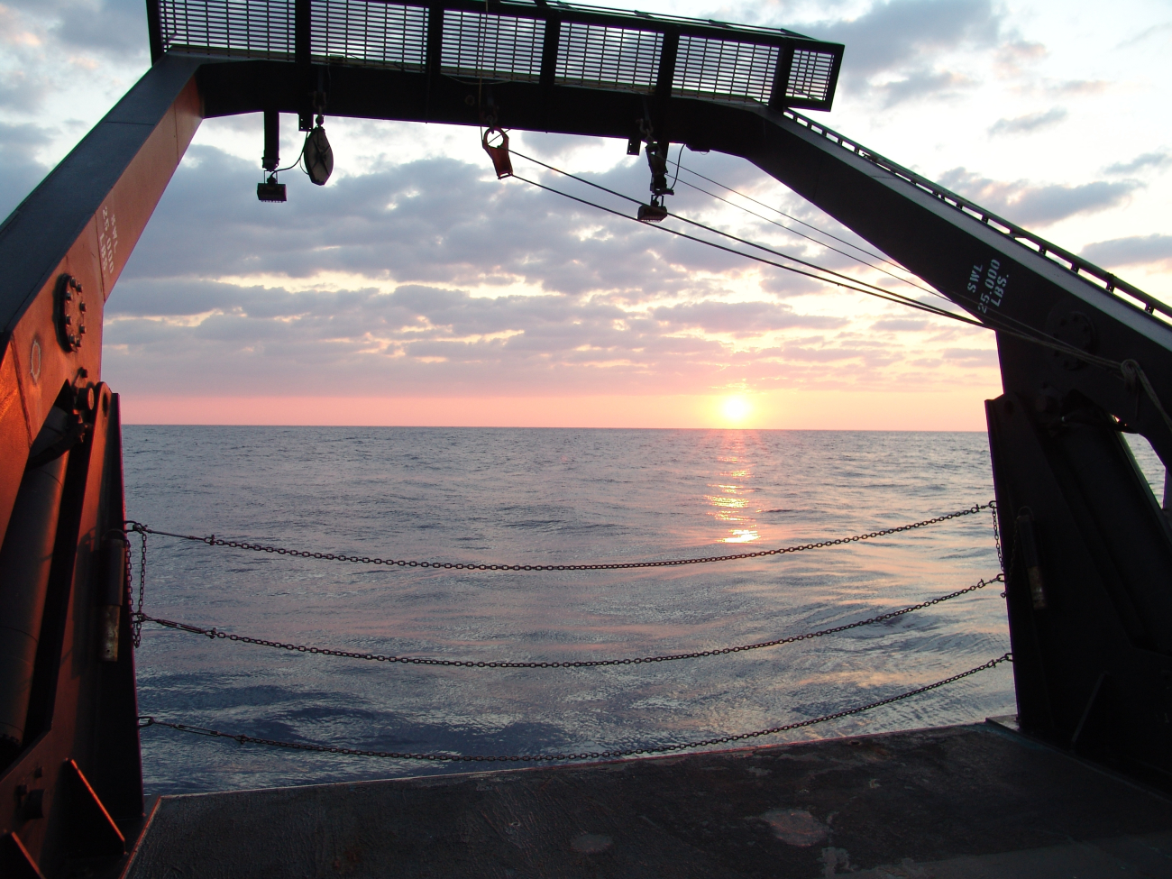 Sunset framed in the A-Frame of the NOAA Ship NANCY FOSTER