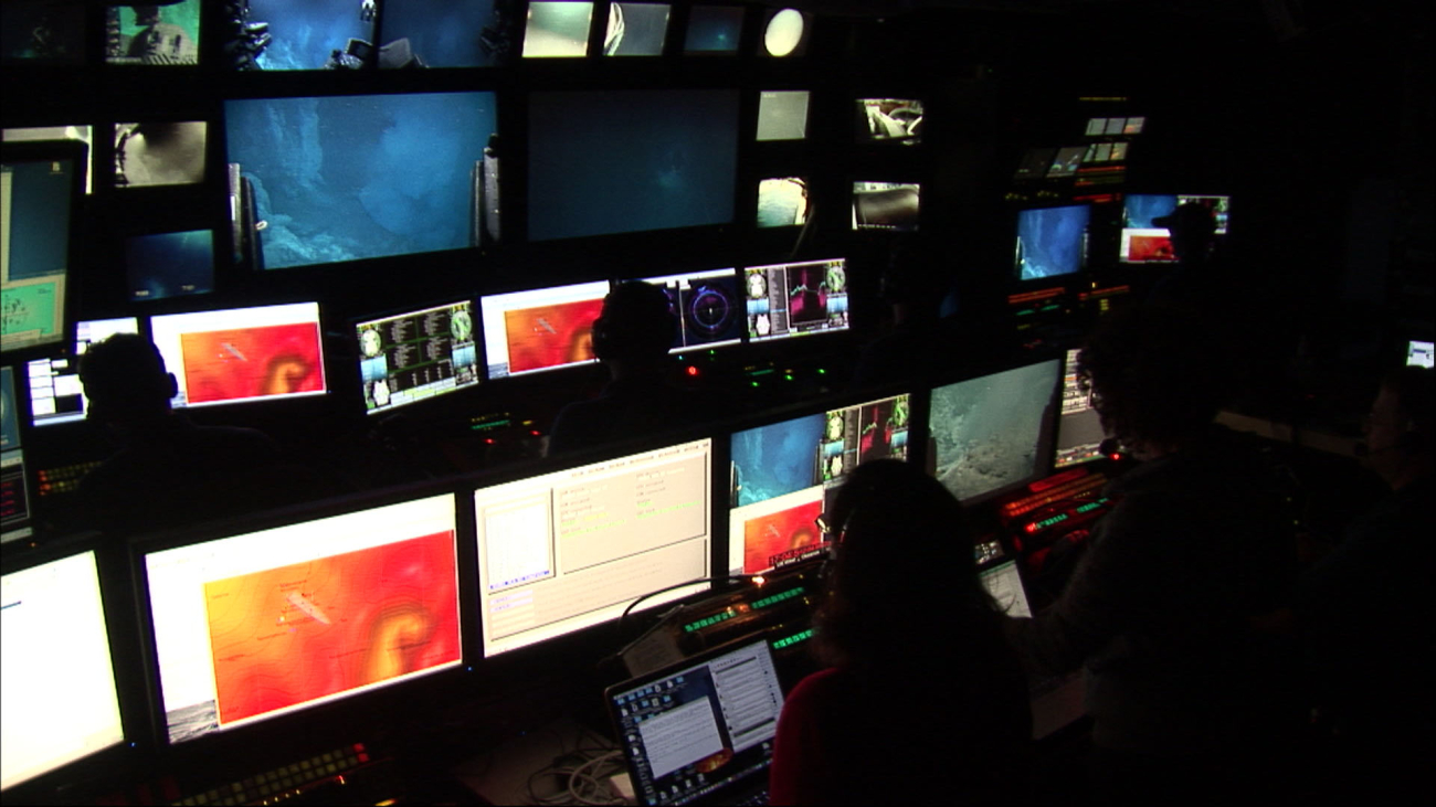 Control room on OKEANOS EXPLORER with various screens showing parametersassociated with real-time operation of Deep Discoverer