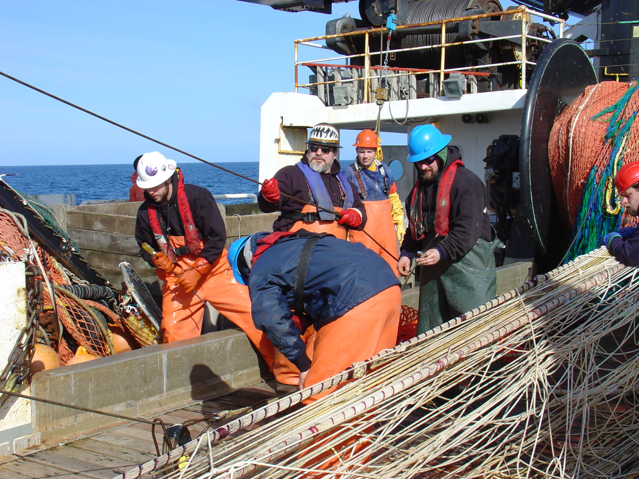 Mid-water rope trawl going out - monitoring third wire attached tonet sensors