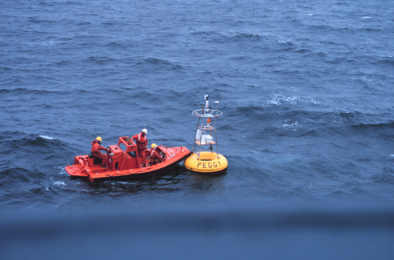 Servicing PEGGY, a meteorological and oceanographic buoy in the Aleutian Islands area