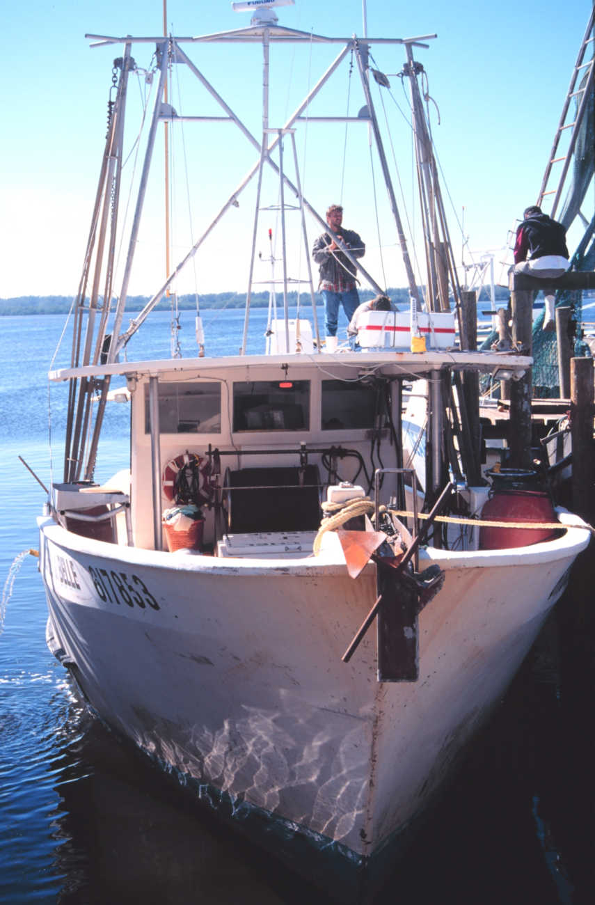 Small multi-purpose fishing boat at A