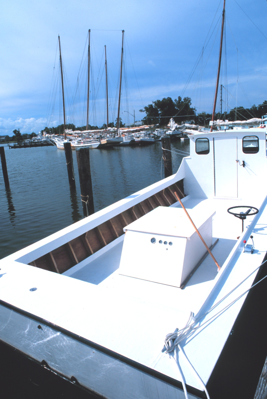 Large open deck work areas are typical of Chesapeake Bay work boats