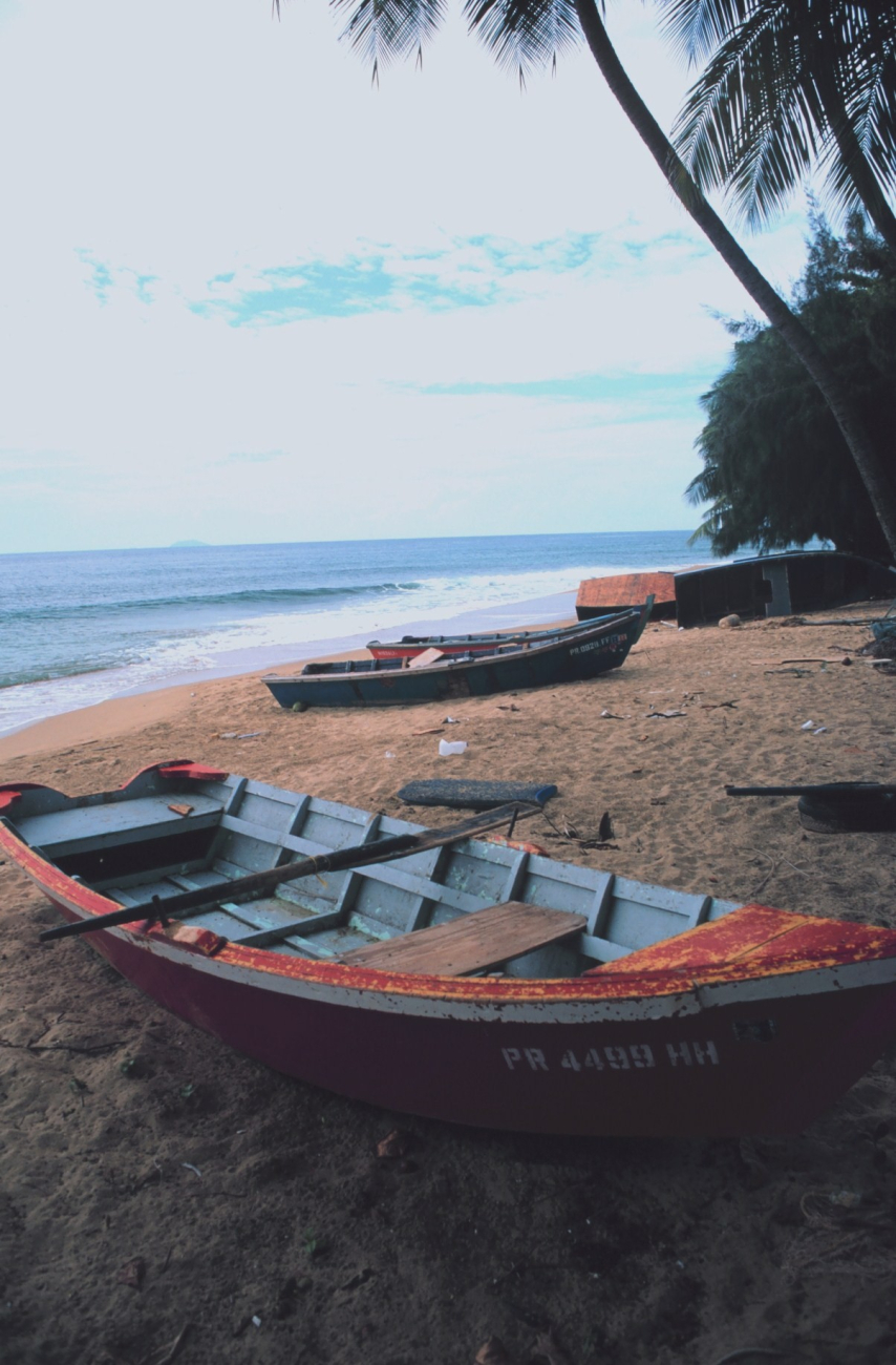 Small scale fishing boats on the beach