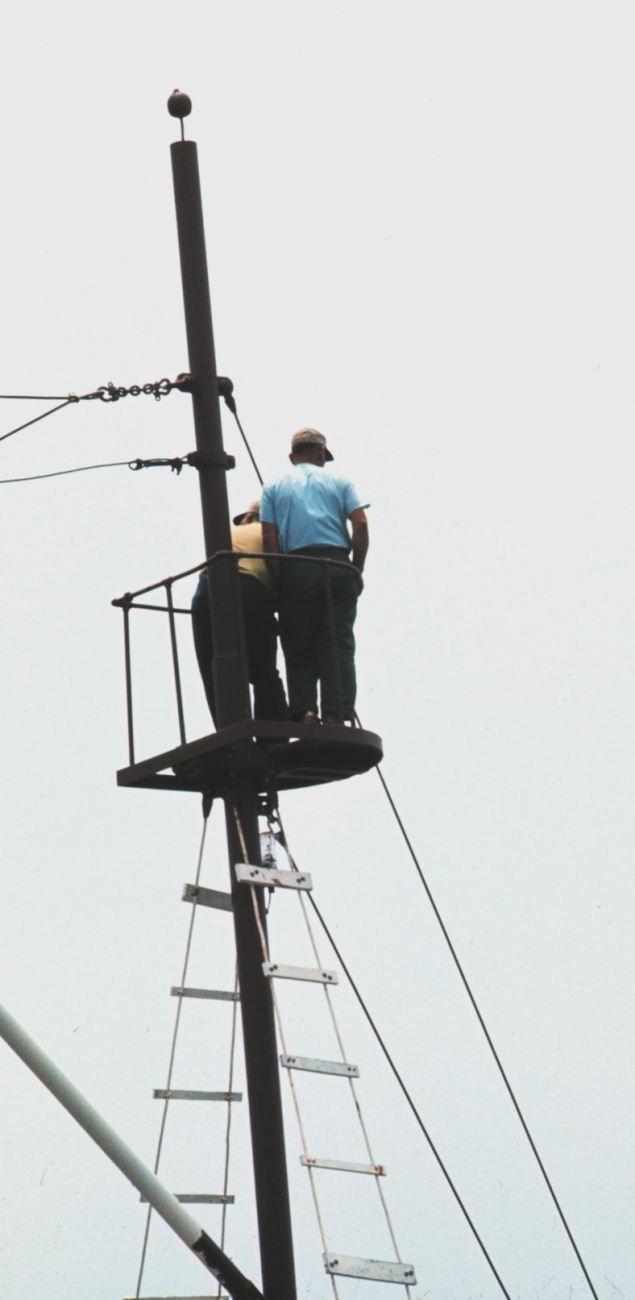 Menhaden fishing - lookout scanning the horizon for signs of menhaden